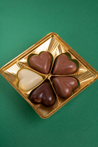 photo chocolate in a package on a green background
