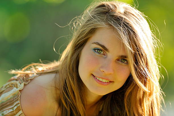 beautiful smiling woman portrait outdoor in summer