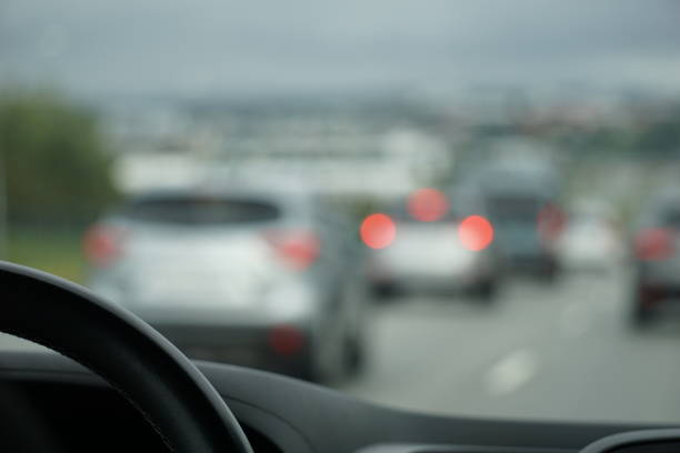 istock Driving a car in a the city 1473181306