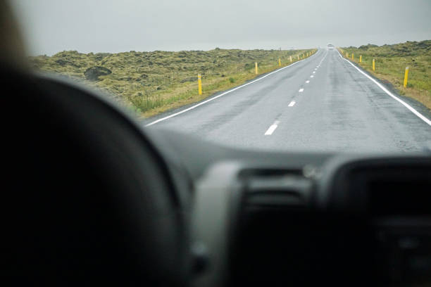 istock Driving a car in Iceland - perspective of a driver 1473181344