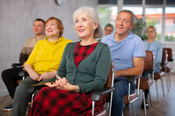 istock Adult students listening in classroom university 1473181537