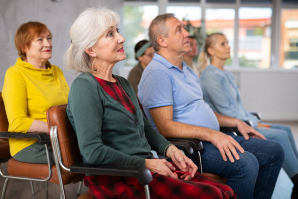 istock Group of mature students attending lecture in college 1473181539