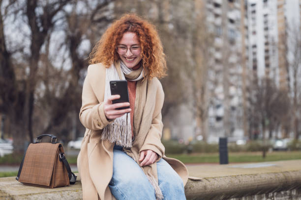 istock Redhead woman outdoor 1473182954