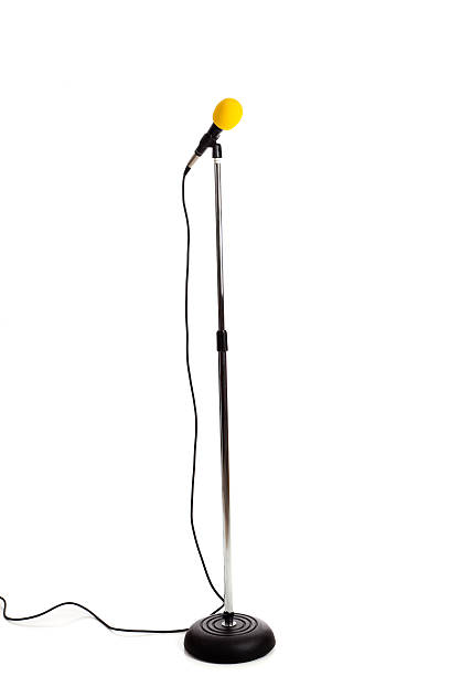 istock Microphone with Yellow wind cover on white background 147318353