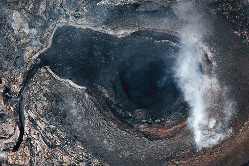 Fagradalsfjall Volcano Crater Eruption in Iceland. Drone Point of view directly down to the erupting volcano crater.