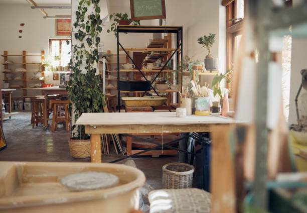 istock Interior, pottery and workshop of small business in ceramic arts, crafts or creative studio of startup business. Empty work station of a artistic room for clay crafting, paint or molding classroom 1473185114