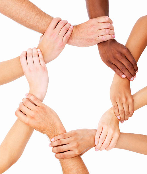 Group of human hands showing unity Group of human hands showing unity sea of hands stock pictures, royalty-free photos & images