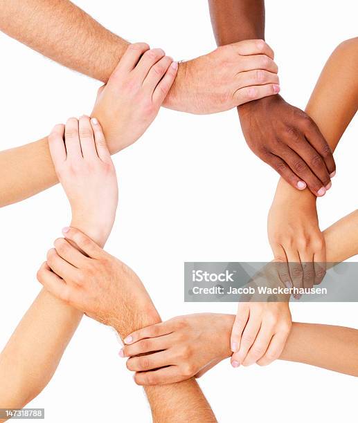 Group Of Human Hands Showing Unity-foton och fler bilder på Knäppta händer - Knäppta händer, Vit bakgrund, Ansvar