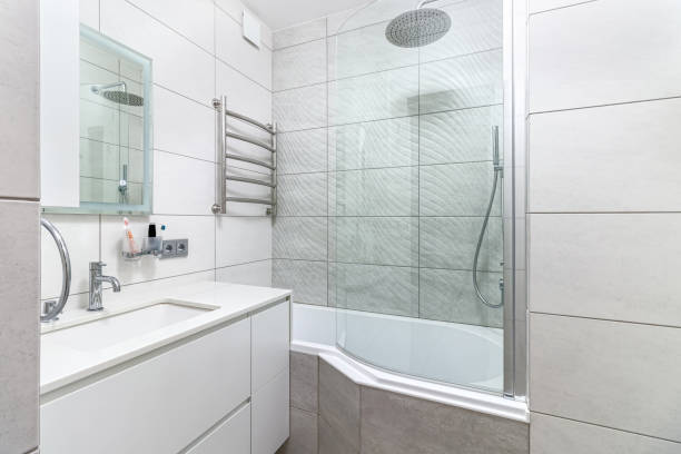 istock Modern bathroom in white washing and bathroom, and a big shower 1473187913