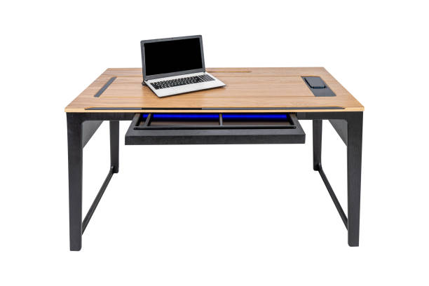 istock Expensive luxury office table. laptop on the office table isolated on white 1473189317