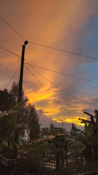 istock Rainbow Sunset in the Farmland 1473190198