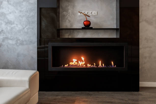 istock Bio Fireplace burn on ethanol gas. Contemporary mount biofuel on ethanol fireplace fireplace. Modern smart ecological alternative technologies. Interior design of a house inside 1473191045