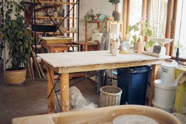 istock Creative, art and pottery with empty room of workshop for design, manufacturing and small business. Ceramics, interior and production with table in studio of for painting, inspiration and retail 1473191451