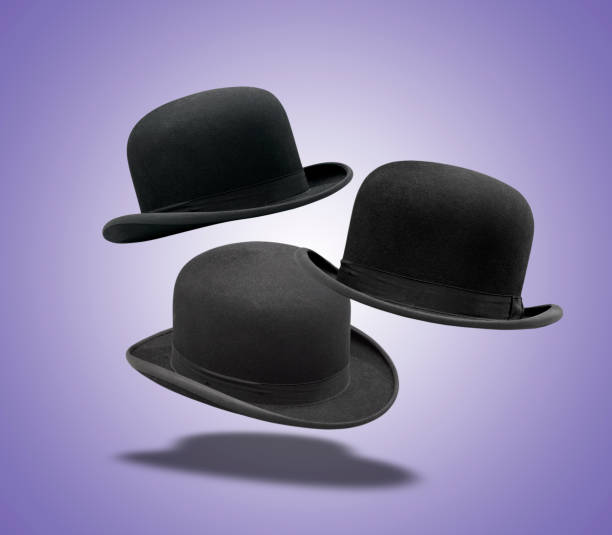 istock Floating Set of stylish black bowler hat 1473191679