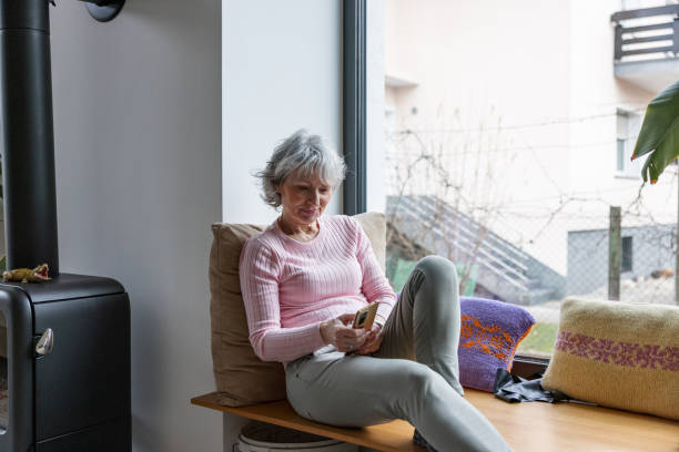 istock Grandmother Relaxing At Home 1473191876