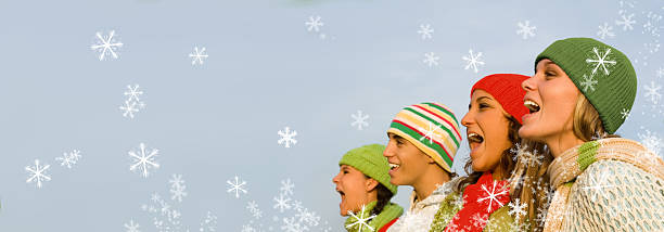 christmas carol singers stock photo