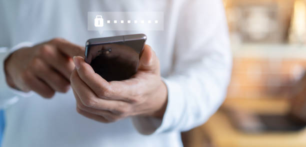 istock close up businessman use smartphone to access account on website by input username and password at office for security system of business technology concept 1473194762