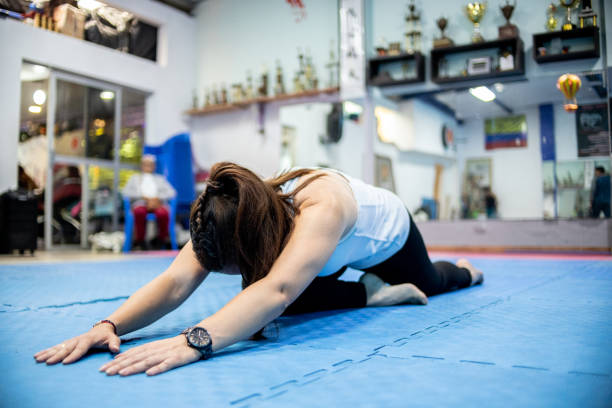 Mature woman during a exercise at gym