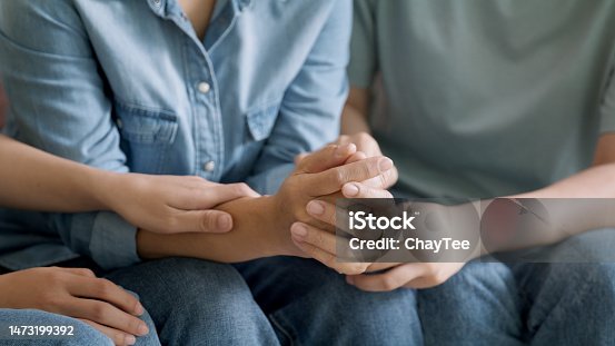 istock Asia people adult child help middle aged old mom crying grief loss tired hold hand stress relief talk with love care at home. Young woman listen to older mum pain sad worry lost in life crisis issues. 1473199392
