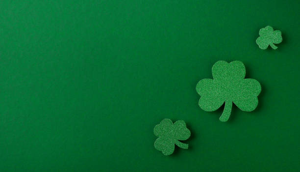istock Saint Patrick day flat lay concept with shamrock clover on green background 1473199694