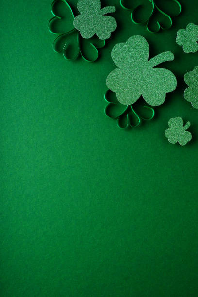 istock Saint Patrick day flat lay concept with shamrock clover on green background 1473199749