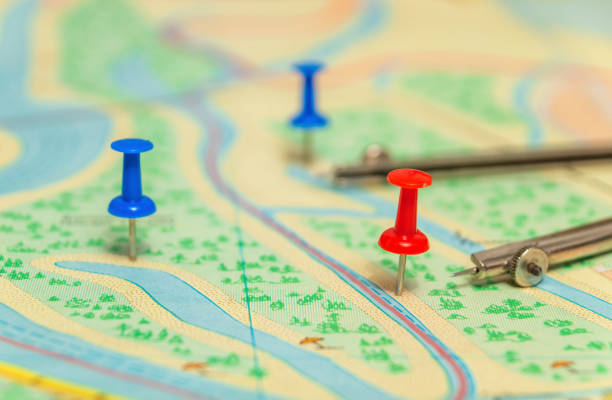 istock The red button on the topographic map indicating the necessary destination 1473202819