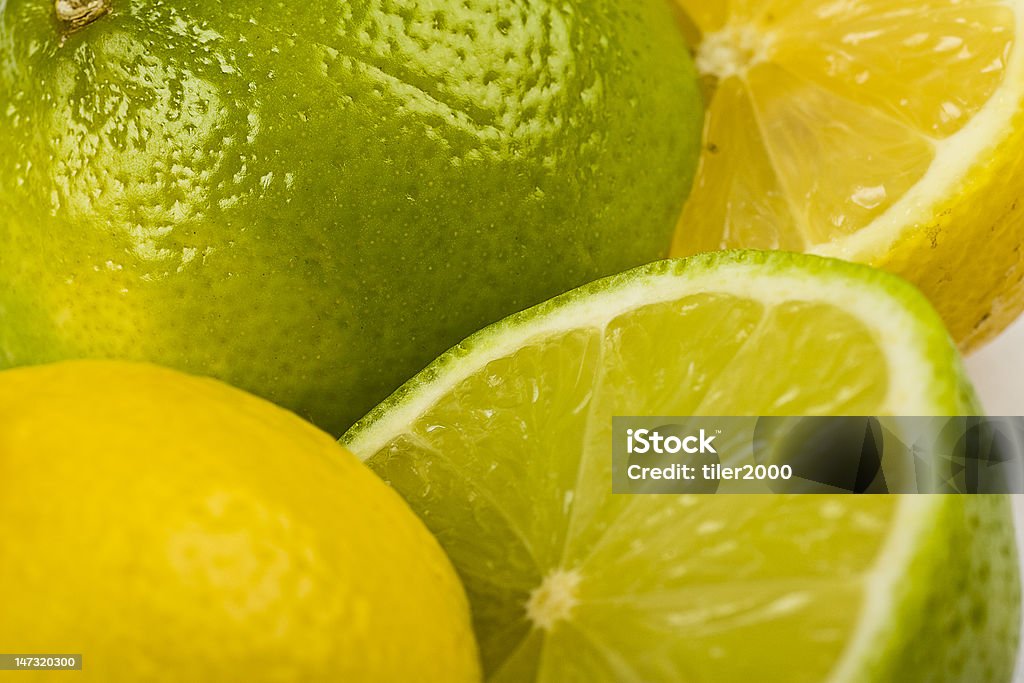 Лимона, лайма половинки - Стоковые фото Белый роялти-фри