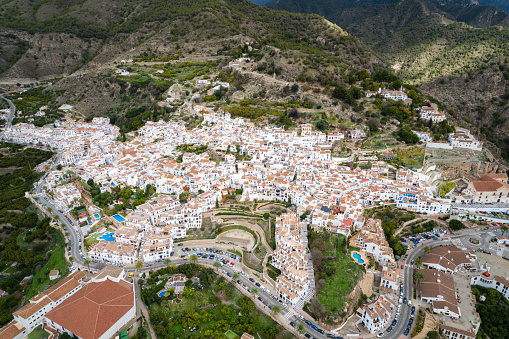 Aerial view above the beautiful village of Genalguacil in Andalusia Spain