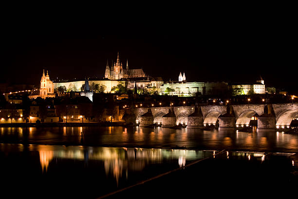 istock Charles bridge in Prague at night 147320454