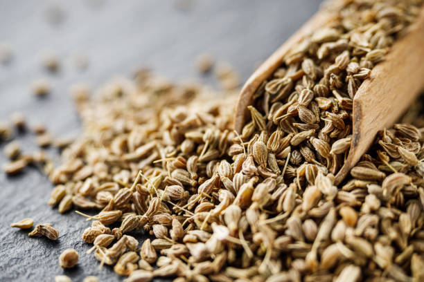 istock aromatic dry anise seeds on a dark black stone background 1473204856