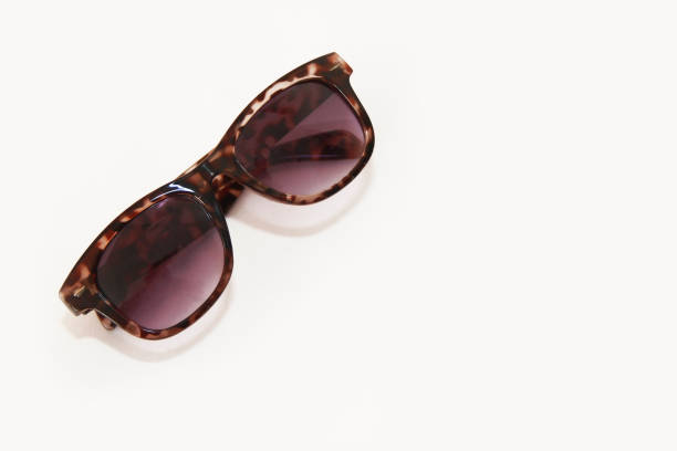 istock Women's sunglasses with dark lenses in a plastic frame 1473207318