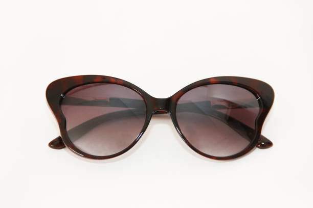 istock Women's sunglasses with dark lenses in a plastic frame 1473207335