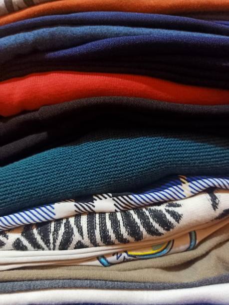istock A pile of assorted ironed and folded clothes 1473210618