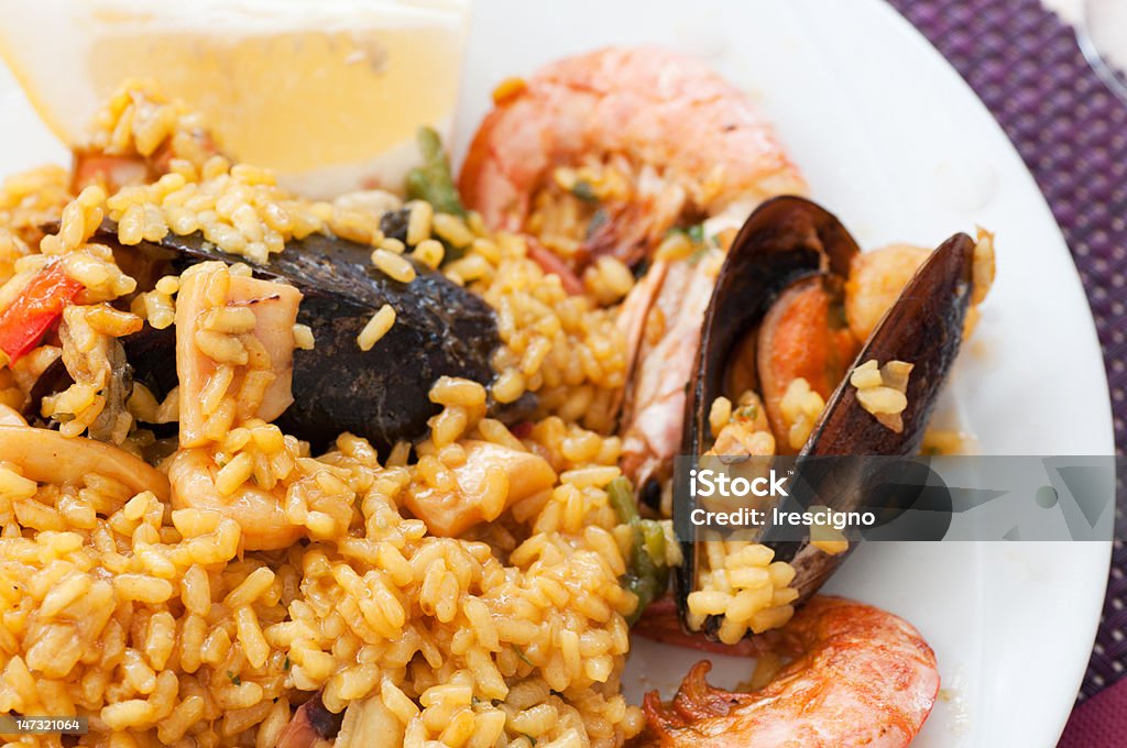 Paella, cucina tradizionale. In Spagna - Foto stock royalty-free di Aglio - Alliacee