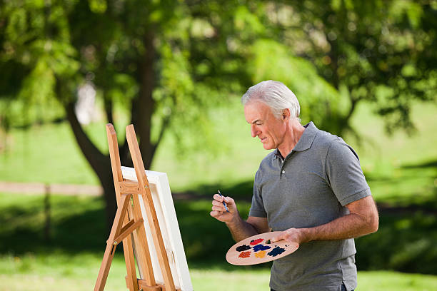 istock Senior man painting 147321081