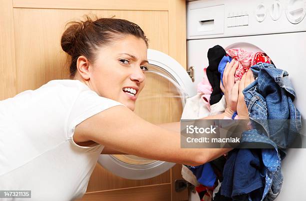 Housewife Doing Laundry Stock Photo - Download Image Now - Adult, Adults Only, Casual Clothing