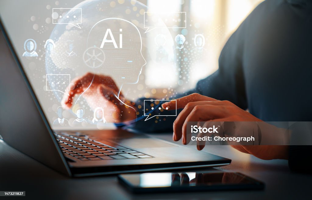 concept of  AI and computer technology Computer and hands close up. The concept of artificial intelligence and computer technology. Artificial Intelligence Stock Photo