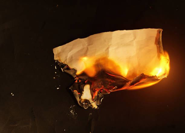 istock Burning piece of paper with blank space for your copy 1473212869