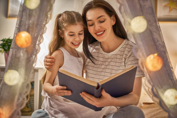 istock Family reading bedtime. 1473214957