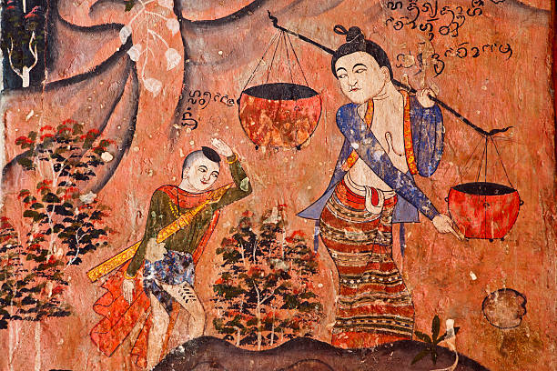 Ancient Thai Mural Painting Ancient Buddhist temple mural depicting a Thai daily life scene at Wat Phumin, a famous temple in Nan province, Thailand. The temple is open to the public and has beautiful murals on the walls which were painted by Thai artisans hundreds of years ago. These beautiful ancient murals have deteriorated over the years but there are still some in good condition. painted image paintings oil paint senior women stock pictures, royalty-free photos & images