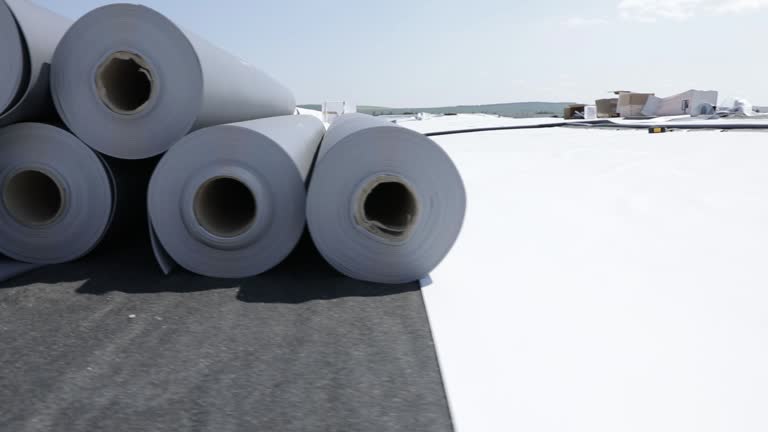 Stack of synthetic pvc membrane rollers on a flat roof