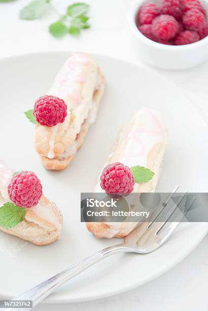 Eclairs With Raspberries Stock Photo - Download Image Now - Baking, Berry Fruit, Cake