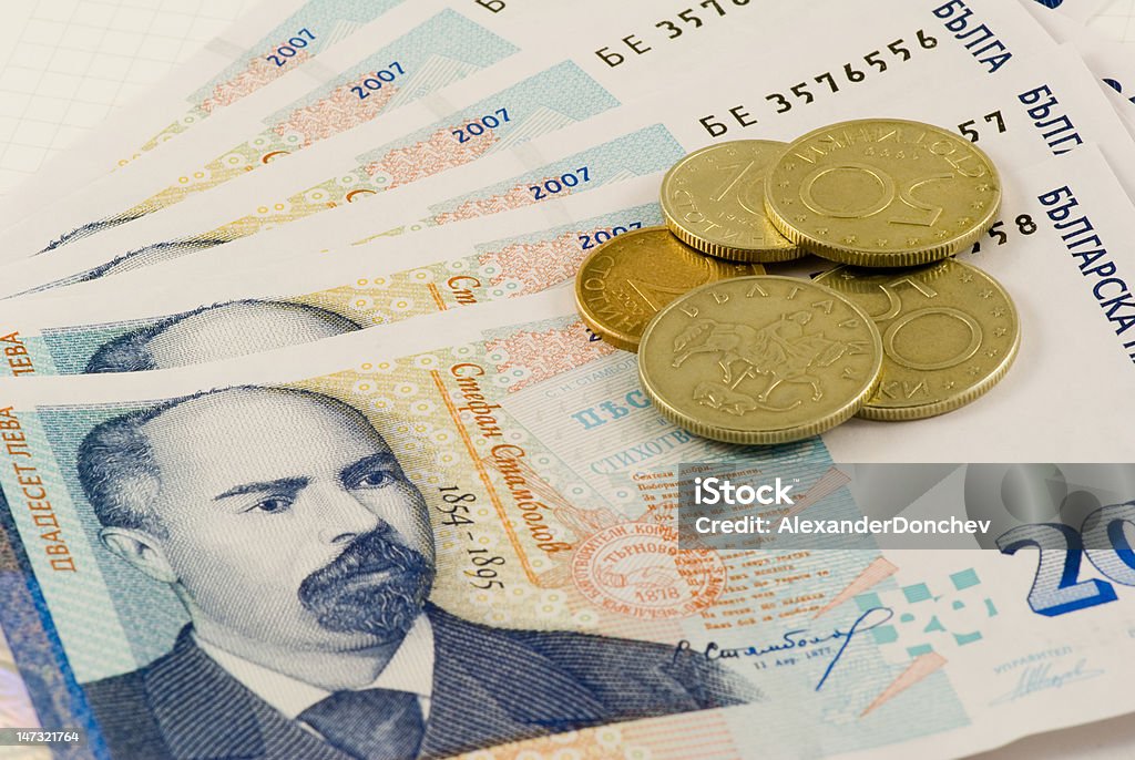 Banknotes and coins 1 Bulgarian currency on white background - closeup Bulgarian Levs Stock Photo