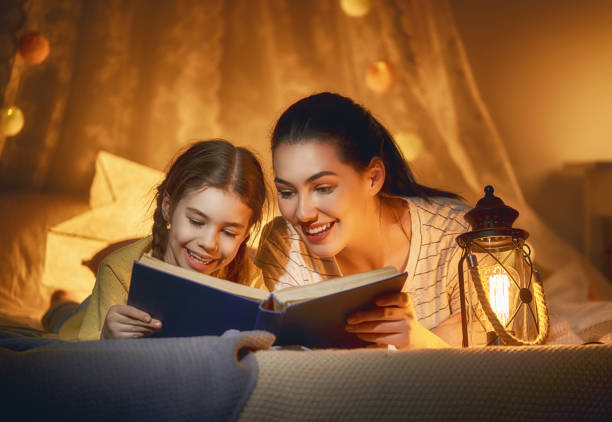 istock Family reading bedtime. 1473217975