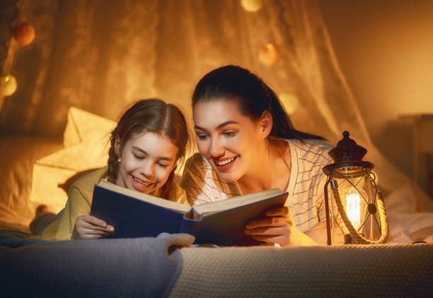 Family reading bedtime. stock photo