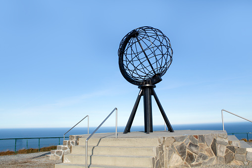 North Cape, Norway - September 25, 2017: Globe monument in North Cape. Globe monument is the most photographed object at North Cape which is the northernmost point of Europe.