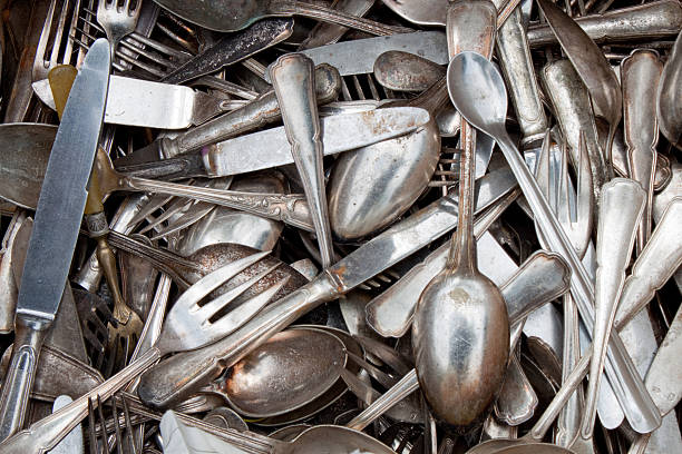 istock Old spoons, forks, and knives on a flea market 147322336
