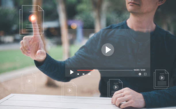istock entertainment life style man sitting outdoor using  internet for streaming online, watching video on internet, live concert, show or tutorial 1473224087