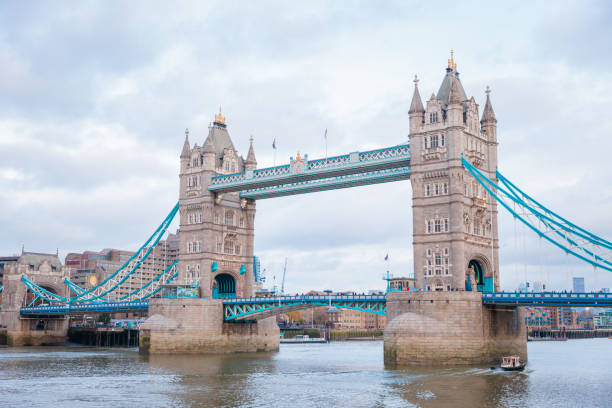 istock tower bridge in london at evening, cloudy daytime 1473226611
