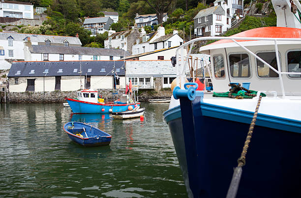 istock Polperro fishing village harbor 147322749